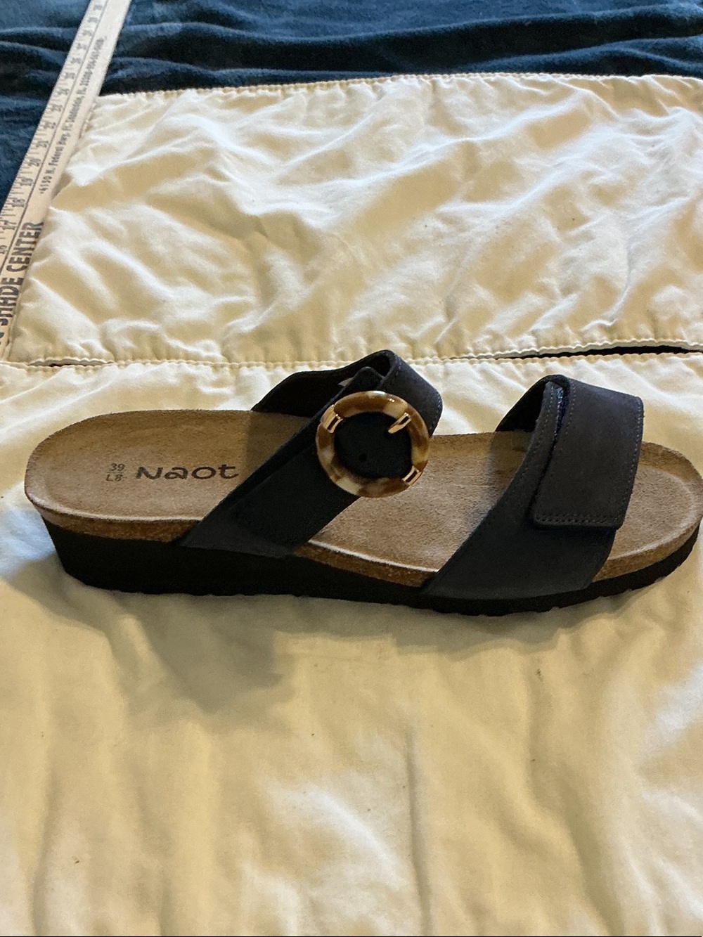 Naot Black Slide Sandal with Tortoiseshell Ring Accent